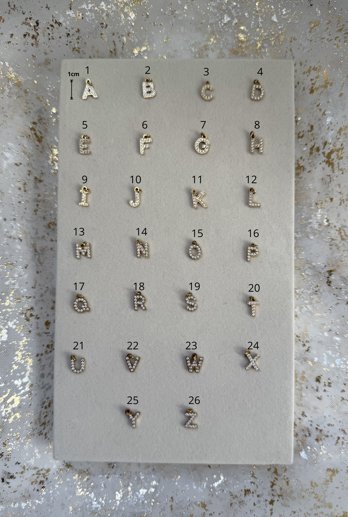 BASE | Colliers à charms